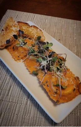 Prepared dish garnished with microgreens